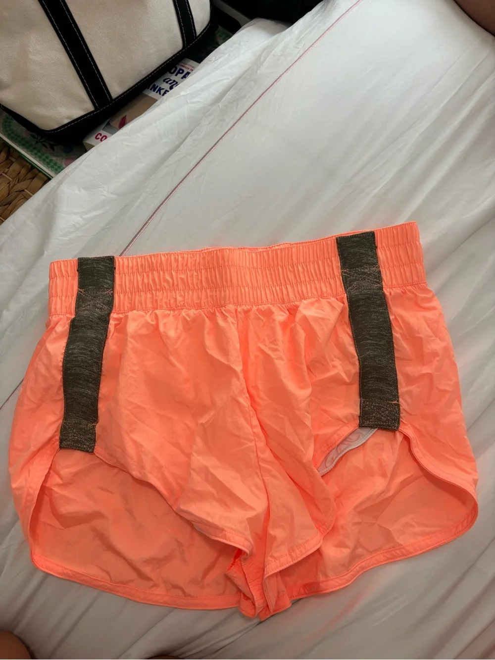 Free People Neon Orange Athletic Shorts with Dark Gray Straps